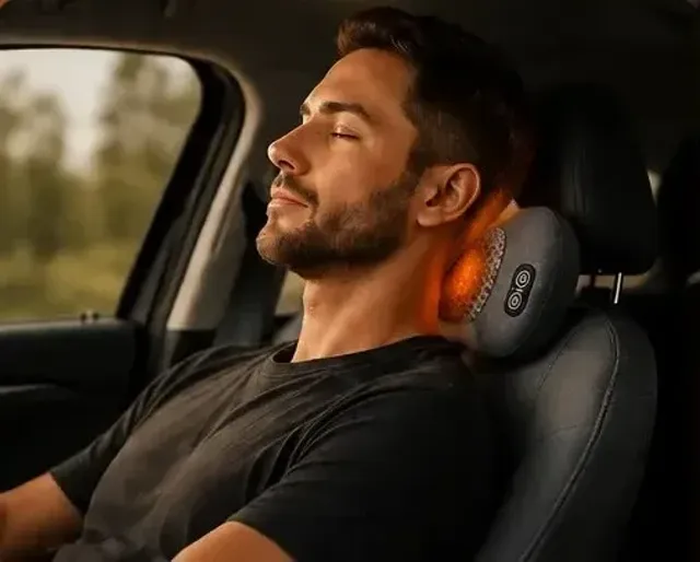 Man resting Back Halo Max behind his neck while sitting in a car
